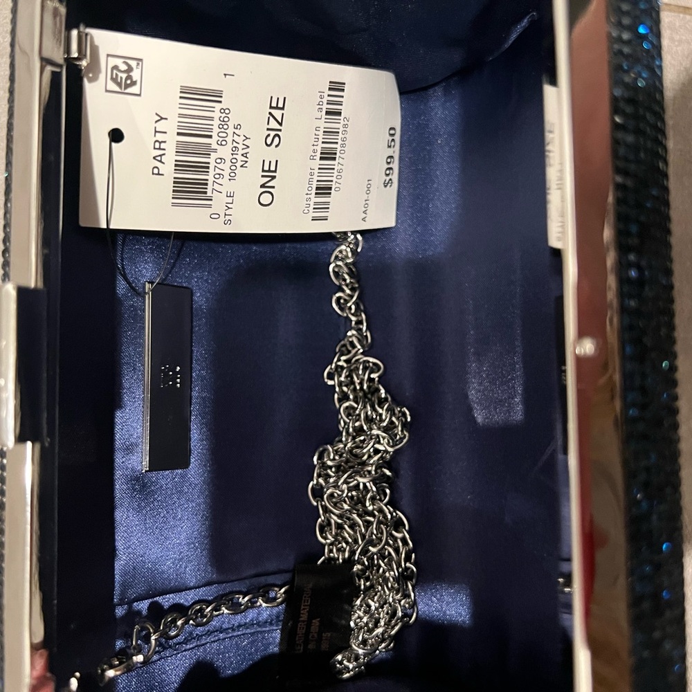 INC CLUTCH - Picture 3 of 5